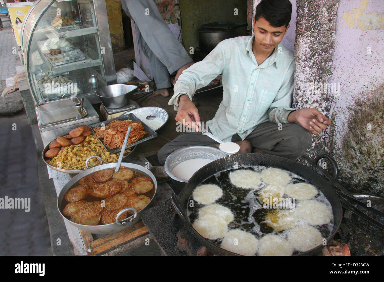 Indian Traditional Sweet Named Malpua Cooking in Hot Oil in Kadai (Frying  Pan). This Delicious Dessert is Famous in Ajmer - Rajasthan, India. Stock  Photo