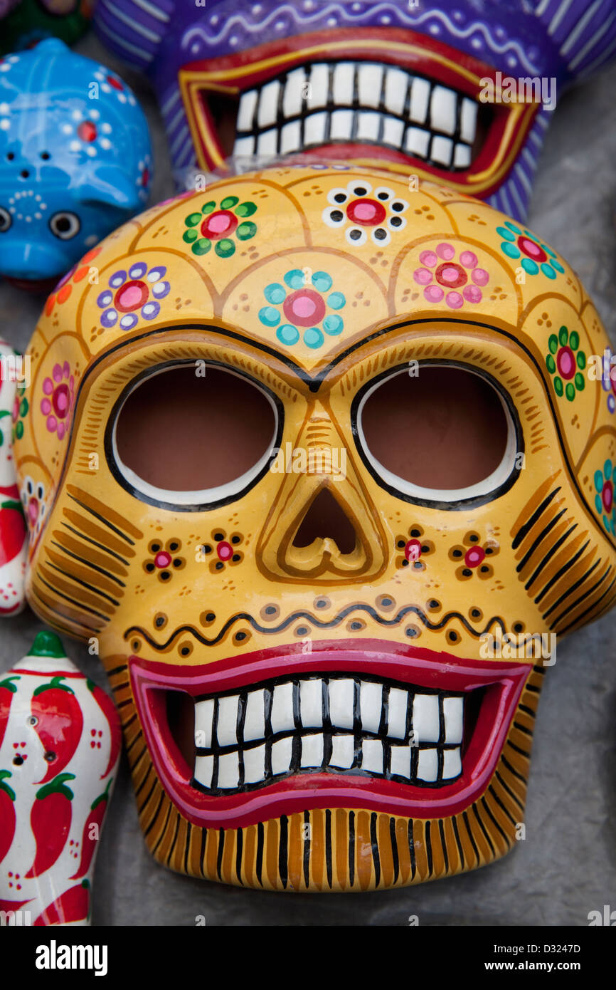 Closeup of handpainted skull for sale during Day of the Dead celebration at market on Zocalo, Oaxaca, Mexico. Stock Photo