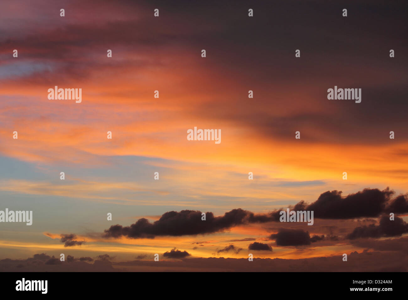 Cloudy orange sky at sunset Stock Photo - Alamy