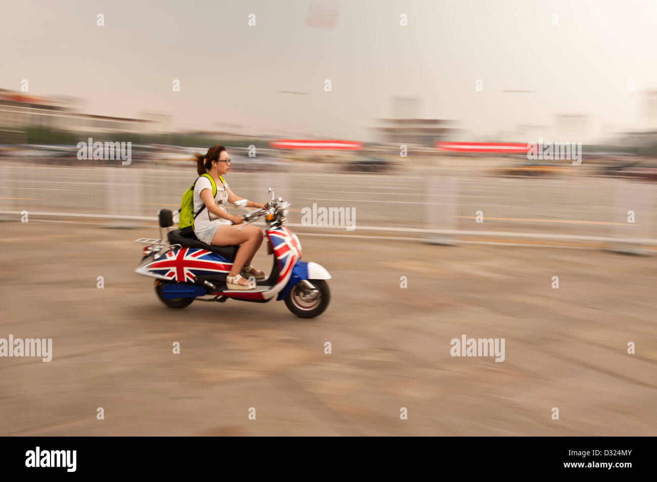 Girl on scooter Stock Photo Alamy