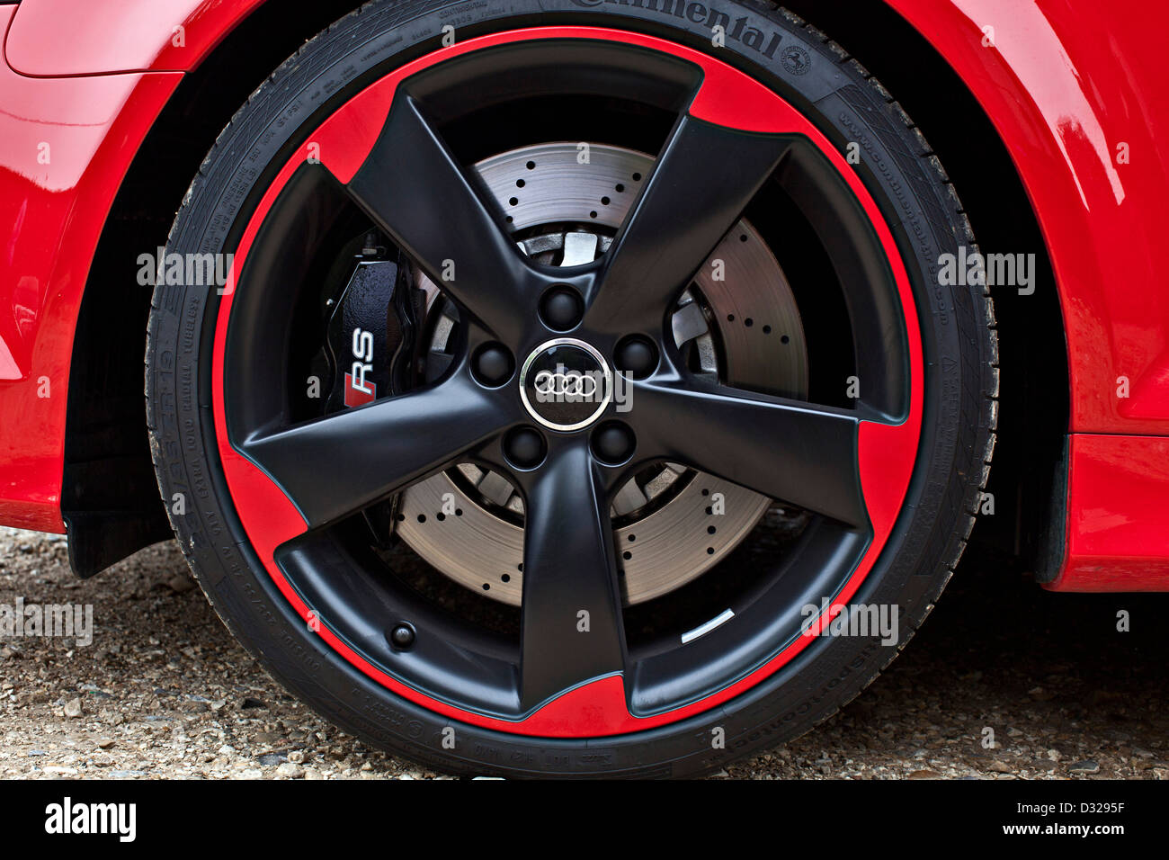 Red Audi RS 3 wheel and logo, Winchester, England, UK Stock Photo