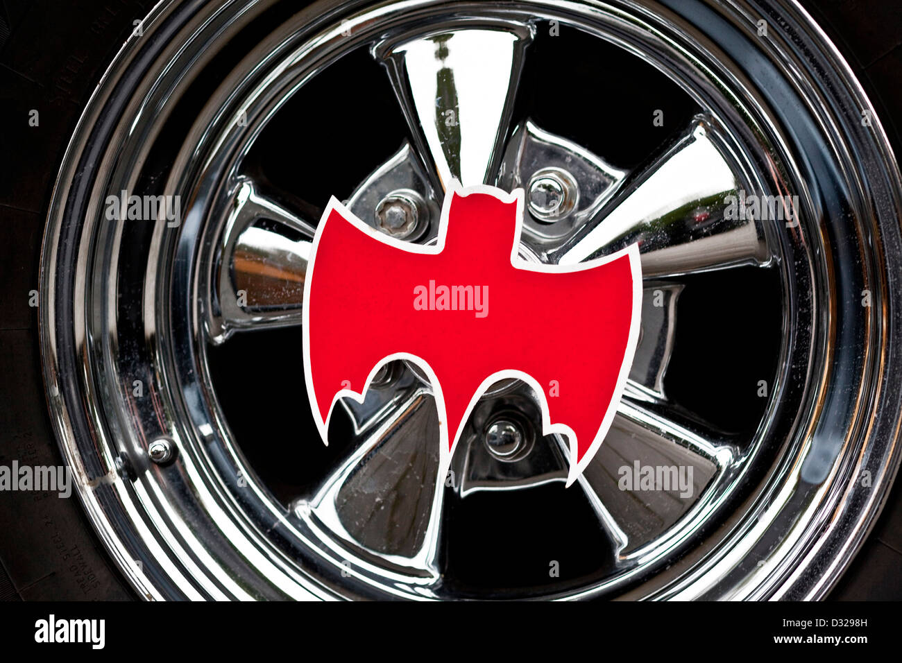 Wheel hub with red logo, Batmobile vehicle interior Stock Photo
