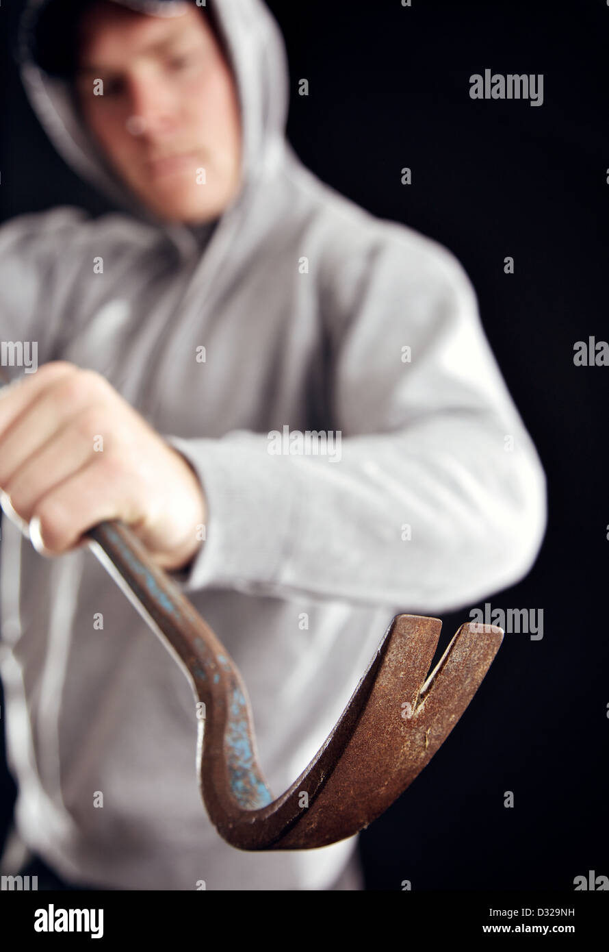 Intruder uses a crowbar in breaking into your home Stock Photo
