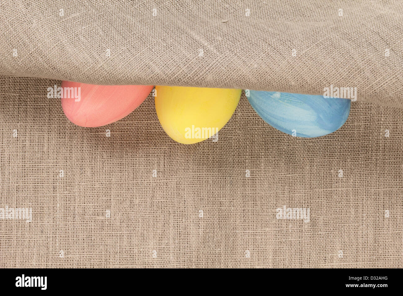 three eggs on burlap, rustic easter background Stock Photo - Alamy