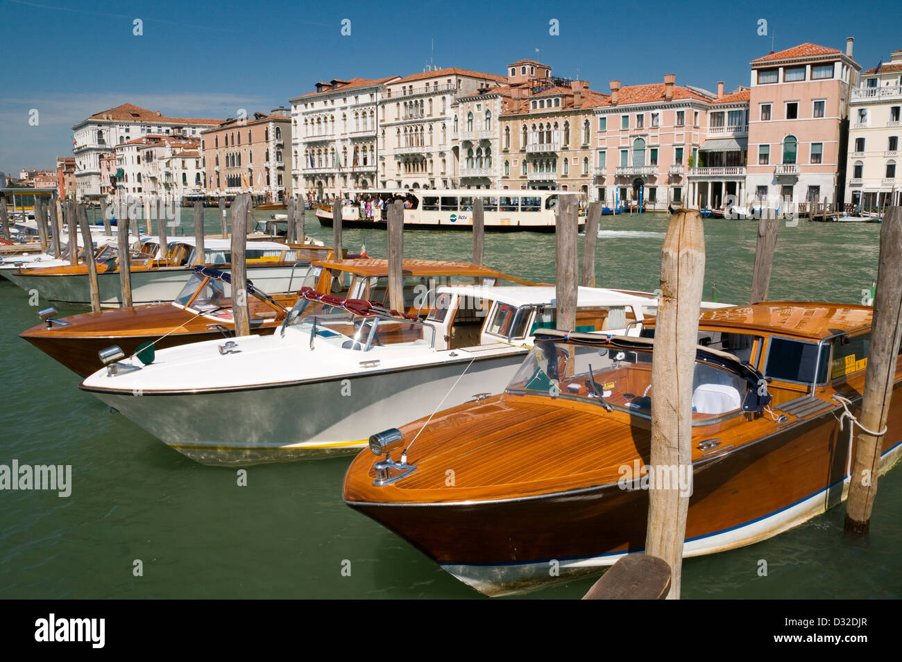 Motoscafi (water-taxis) lined up along the Grand Canal outside Salute, Dorsoduro, Venice, Italy. Stock Photo