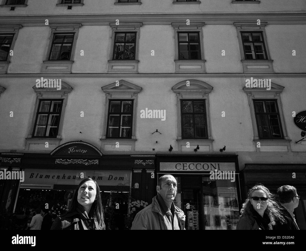 Heads of people on a sunny street Stock Photo