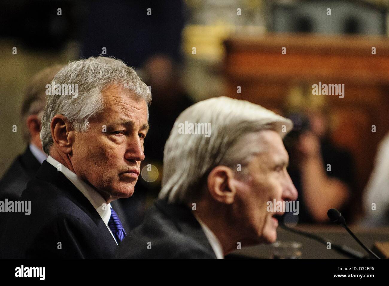 Jan. 31, 2013 - Washington, District of Columbia, U.S. - Former Senator Chuck Hagel (R-NE) looks on as former Senator John Warner Nunn (R-VA) makes his introductory speech to the Senate Armed Services Committe for former Senator Chuck Hagel (R-NE) who is President Obama's nominee to be Secretary of Defense. (Credit Image: © Pete Marovich/ZUMAPRESS.com) Stock Photo