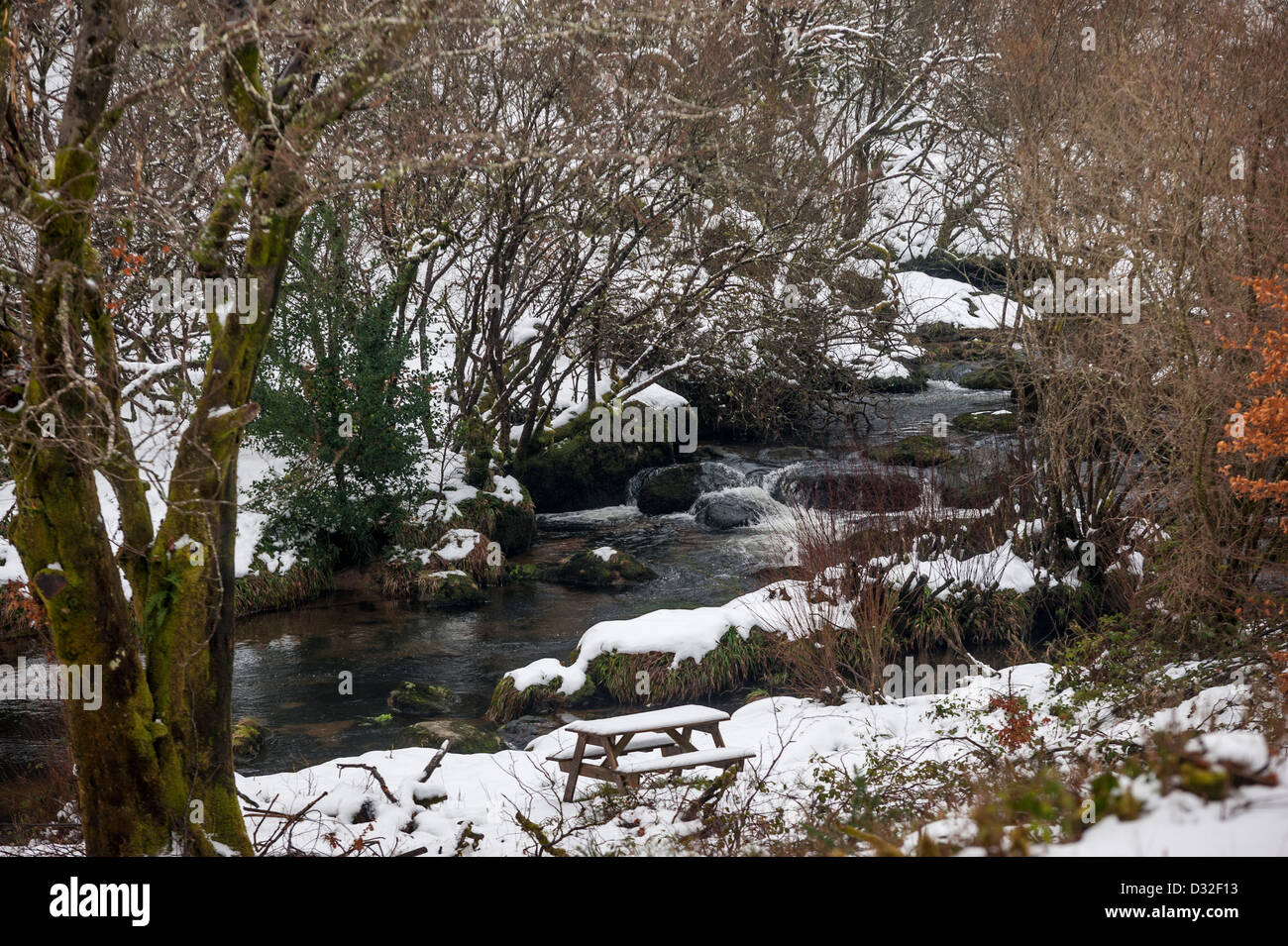 Snowy winter weather on Dartmoor by the East Dart River at Postbridge