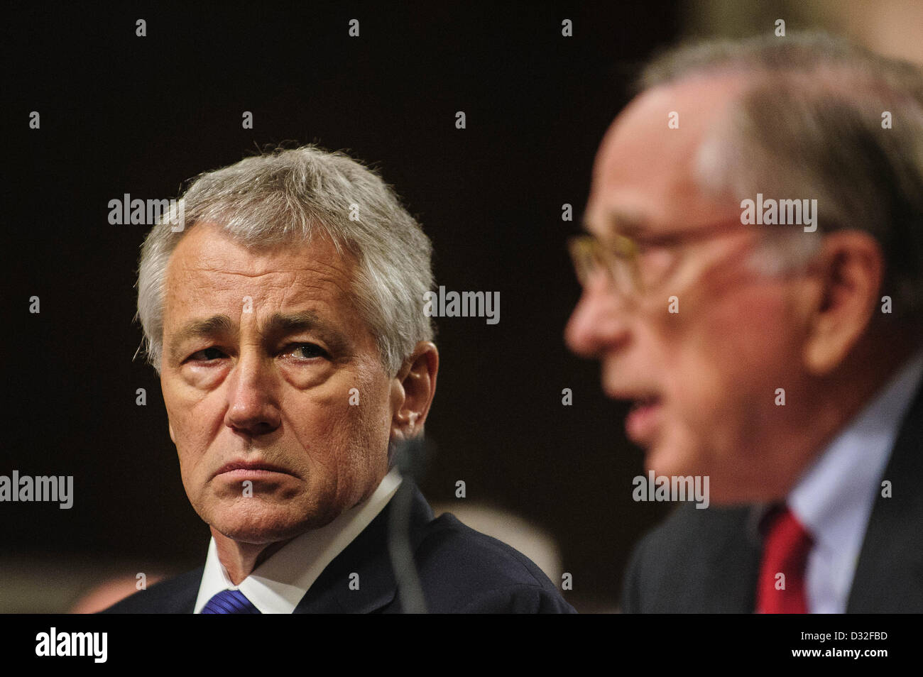 Jan. 31, 2013 - Washington, District of Columbia, U.S. - Former Senator Chuck Hagel (R-NE) looks on as former Senator Sam Nunn (D-GA) makes his introductory speech to the Senate Armed Services Committe for former Senator Chuck Hagel (R-NE) who is President Obama's nominee to be Secretary of Defense. (Credit Image: © Pete Marovich/ZUMAPRESS.com) Stock Photo