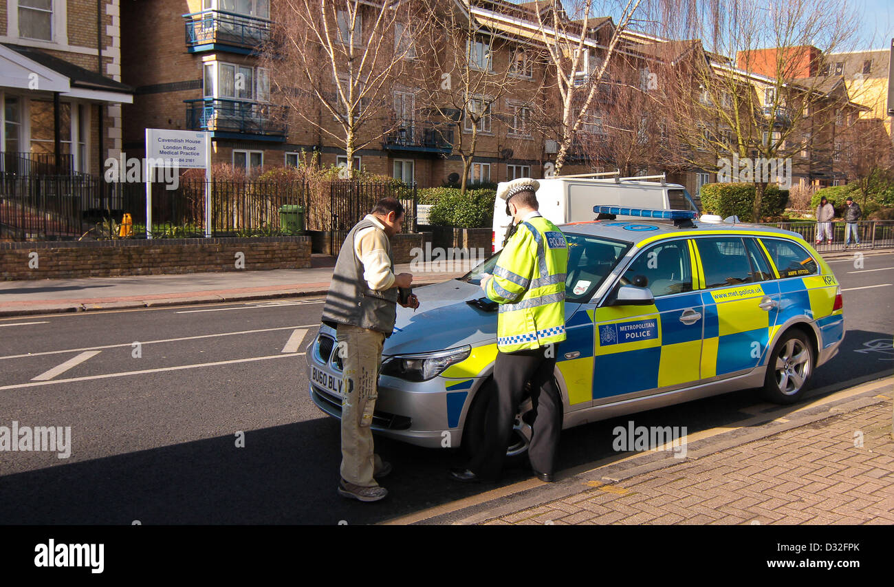 Police stop motorist in Croydon Greater London United Kingdom Stock Photo