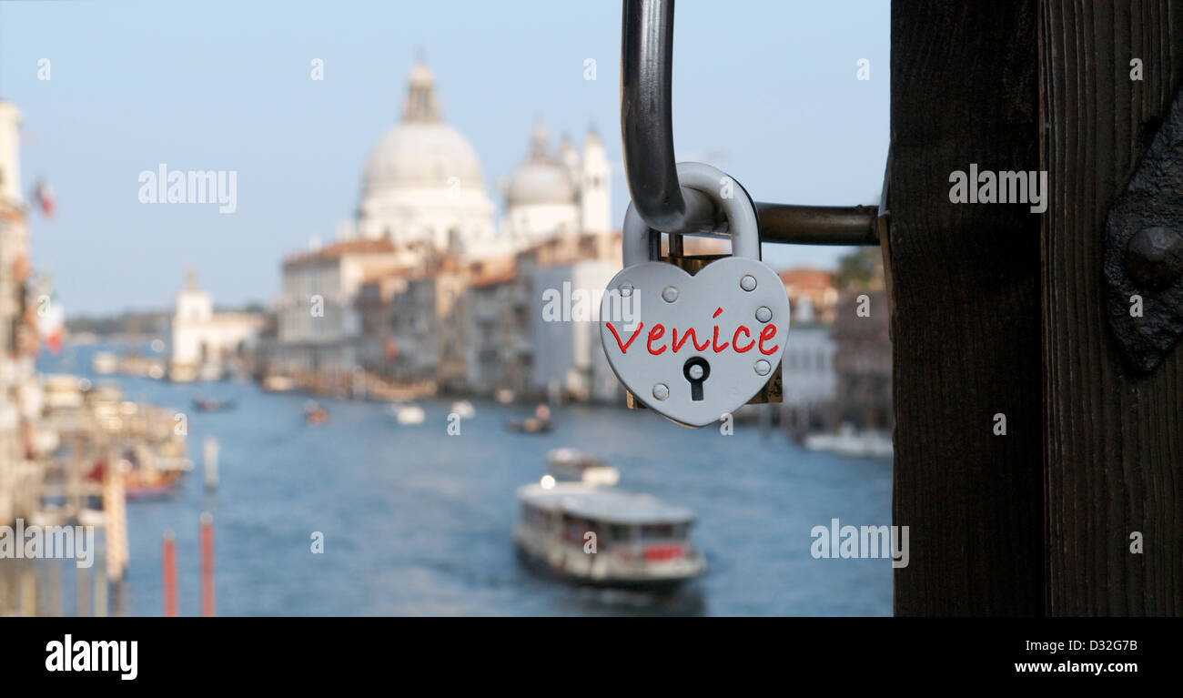 heart shaped love locks lovers padlock attached to the Ponte dell'Accademia bridge over the Grand Canal Venice Italy southern en Stock Photo