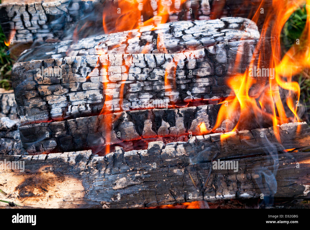 Closeup of a warm fire burning in a campfire Stock Photo