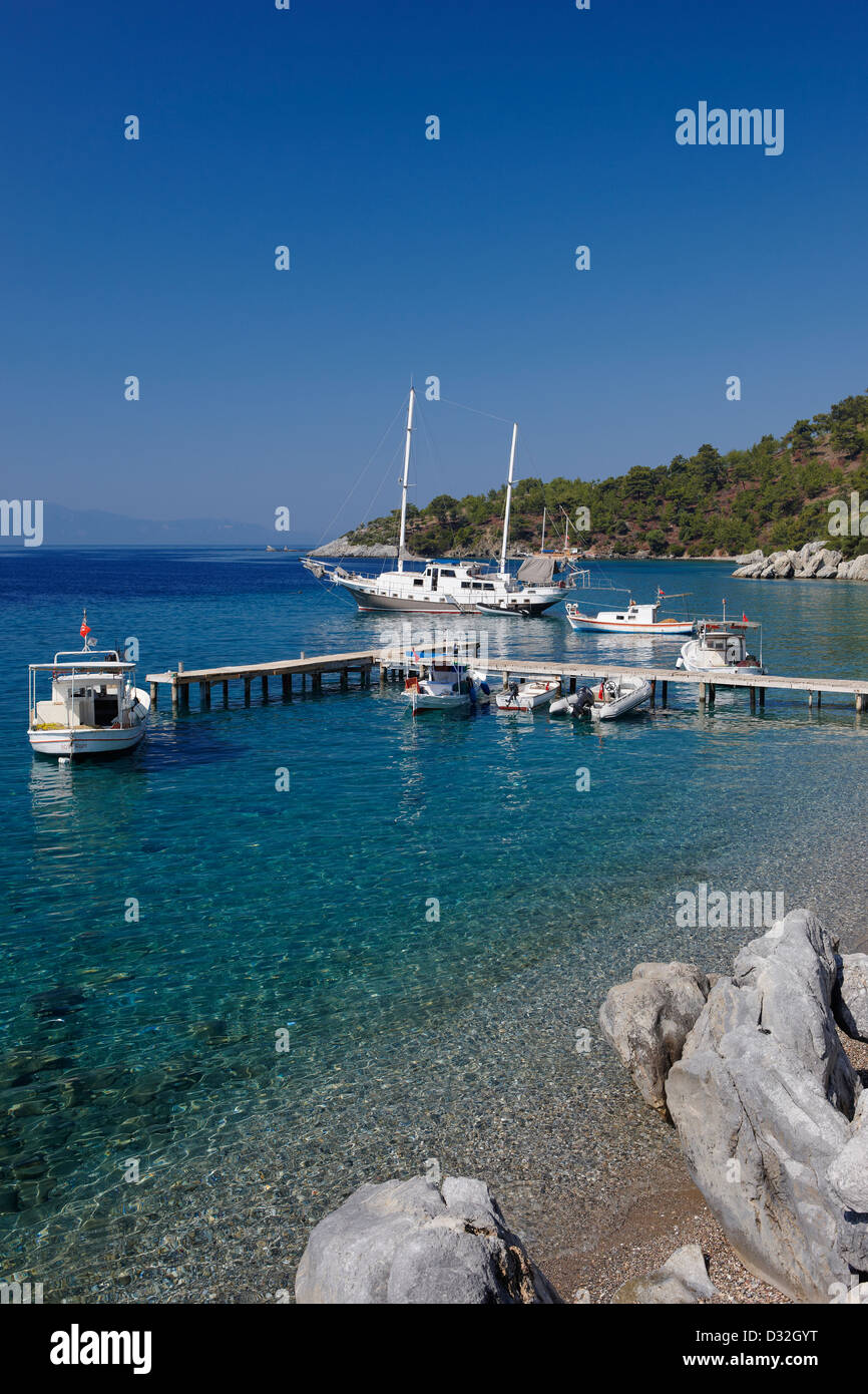 Boats moored at pier near Mazi village. Bodrum peninsula, Turkey. Stock Photo