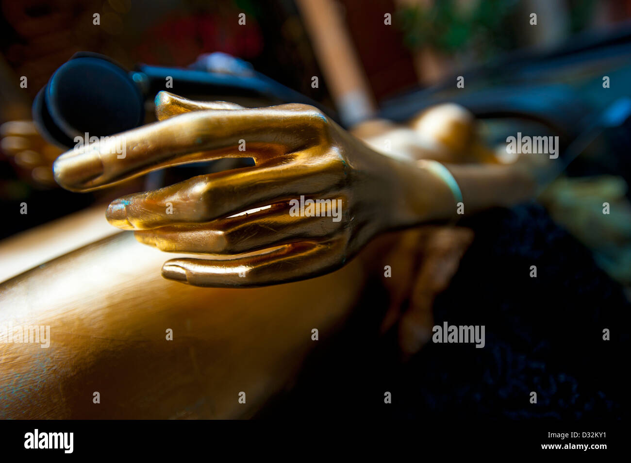 Gold mannequin hand Stock Photo