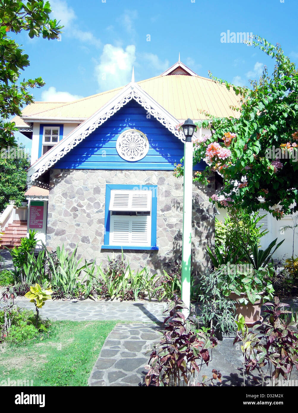Caribbean style stone building with gingerbread trim Bequia St. Vincent and the Grenadines town of Port Elizabeth Stock Photo