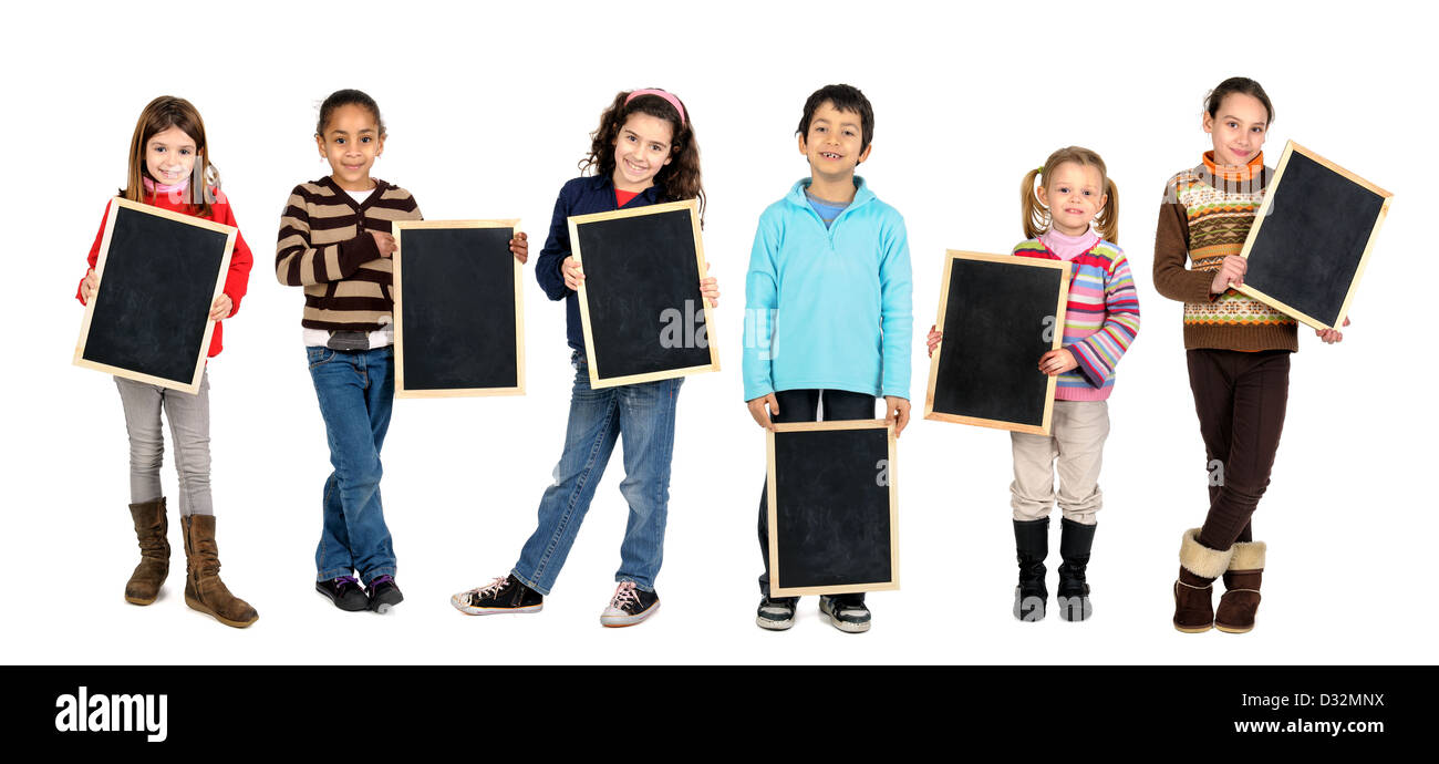 Group of children with black boards isolated in white Stock Photo