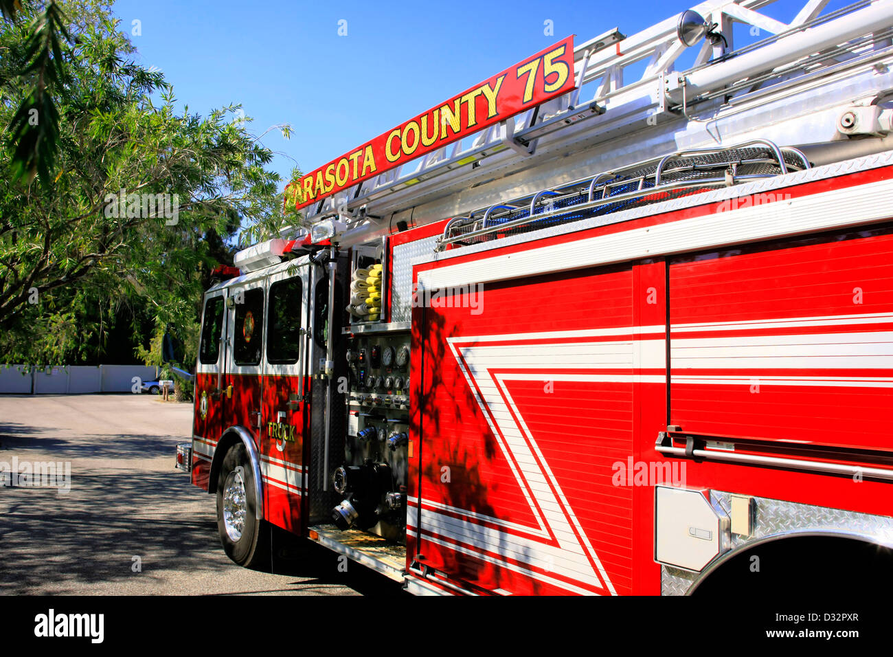 Sarasota County Fire Department truck at a call out in the city suberbs Stock Photo
