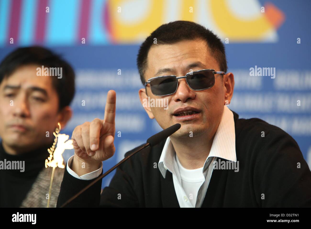Chinese director Wong Kar Wai and actor Tony Leung Chiu Wai (L) attend the press conference of 'The Grandmaster' during the 63rd annual Berlin International Film Festival aka Berlinale at Hotel Hyatt in Berlin, Germany, on 07 February 2013. Photo: Hubert Boesl Stock Photo