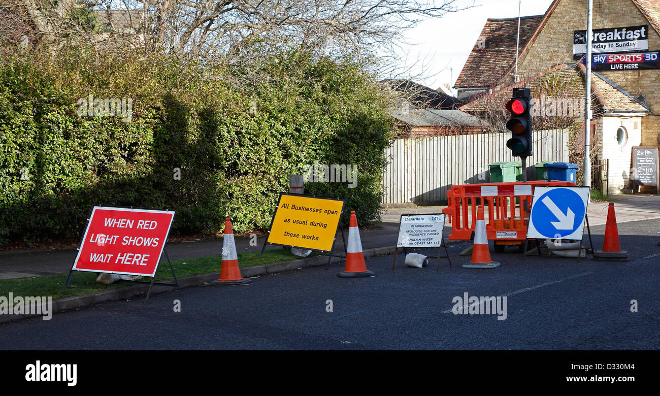 Roadworks signs and traffic lights Milton Cambridgeshire Stock Photo