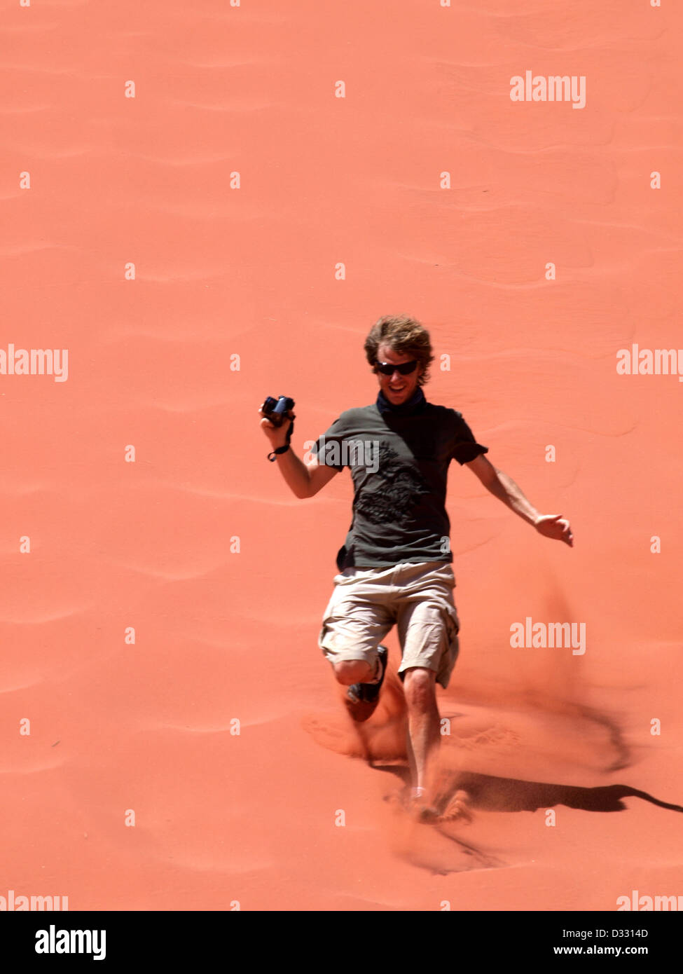 Guy Running Down Red Rocks Backwards Rum running hi-res stock photography and images - Alamy