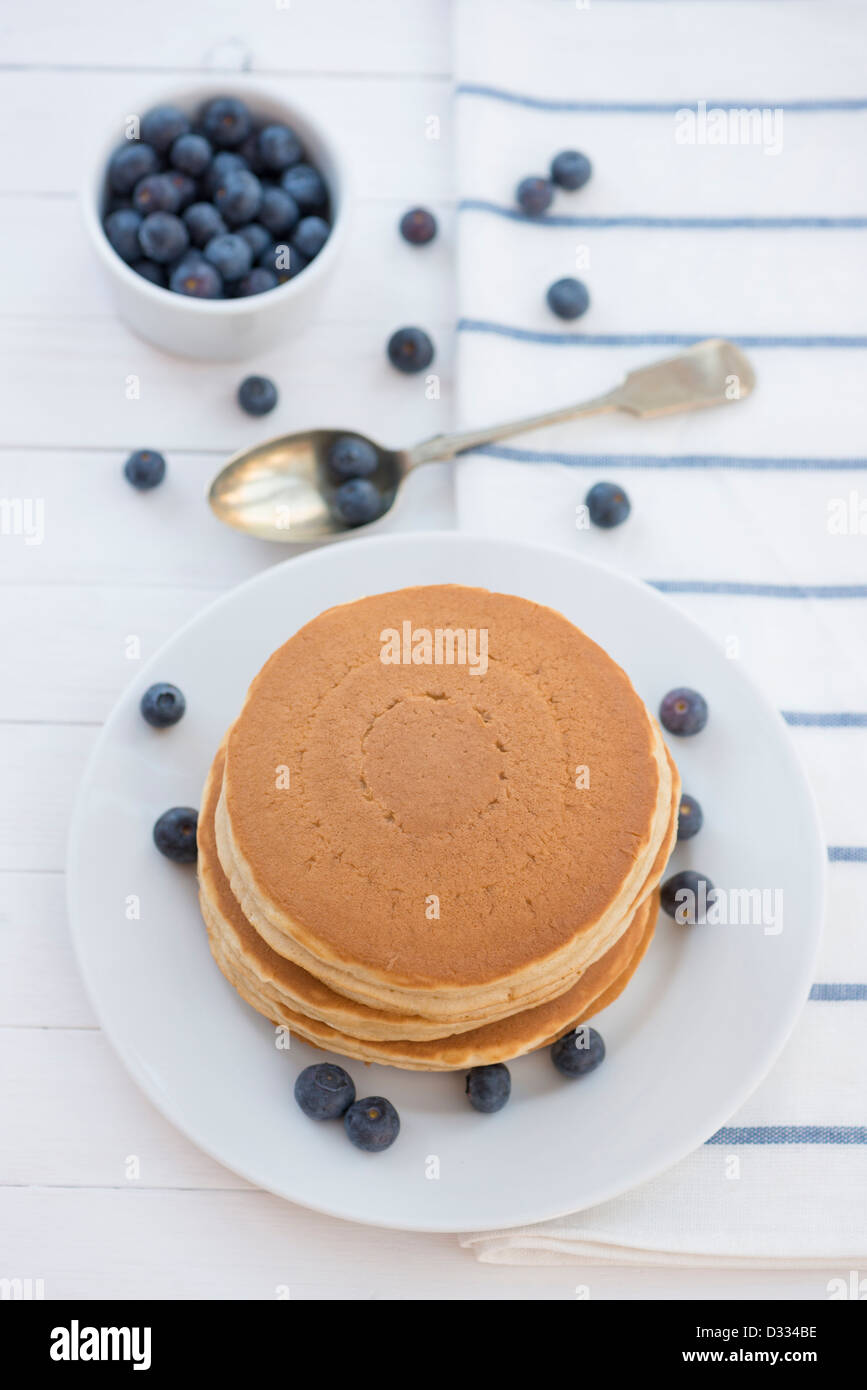 Pancakes, blueberries and honey. Stock Photo
