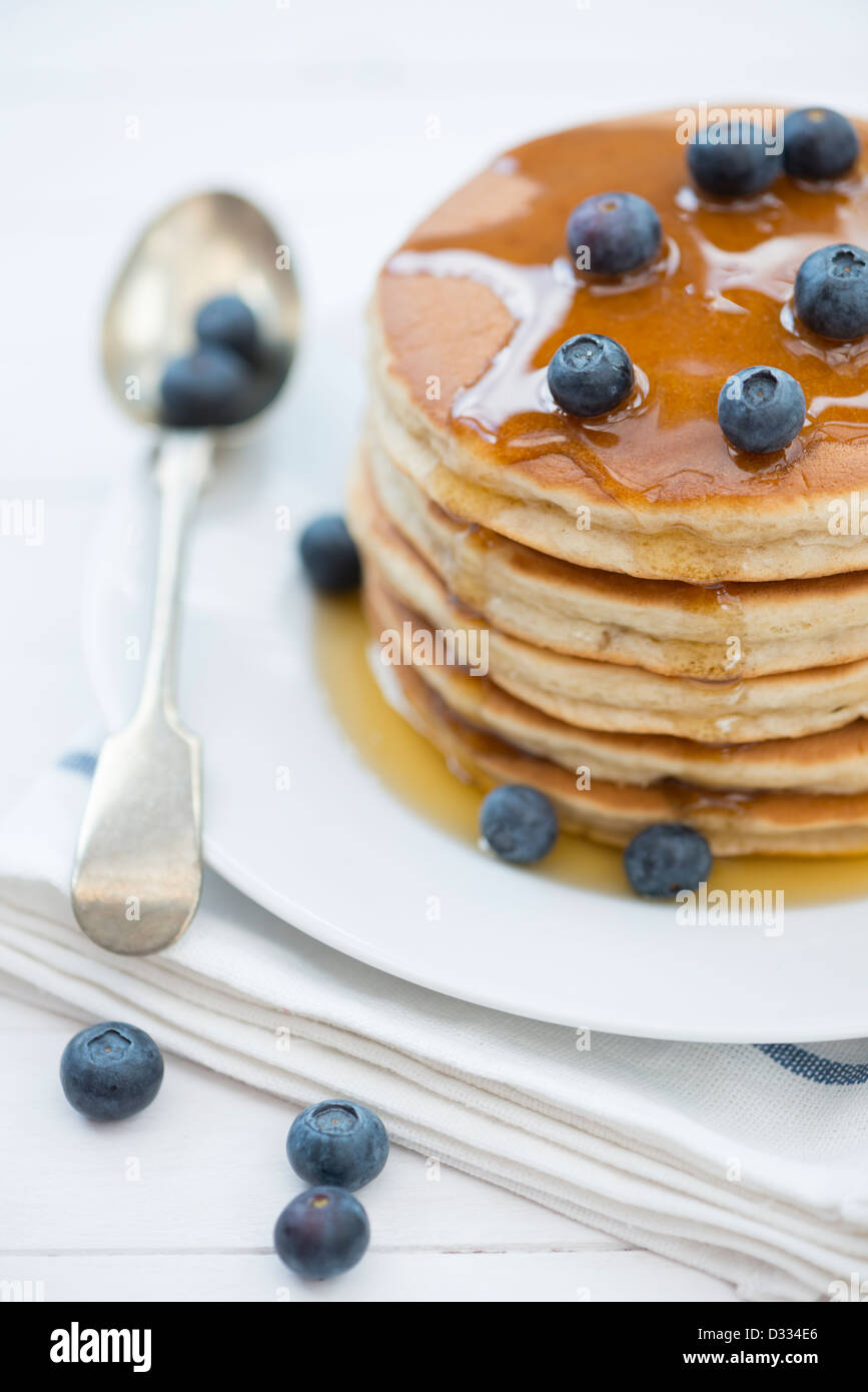 Pancakes, Blueberries And Honey Stock Photo - Alamy