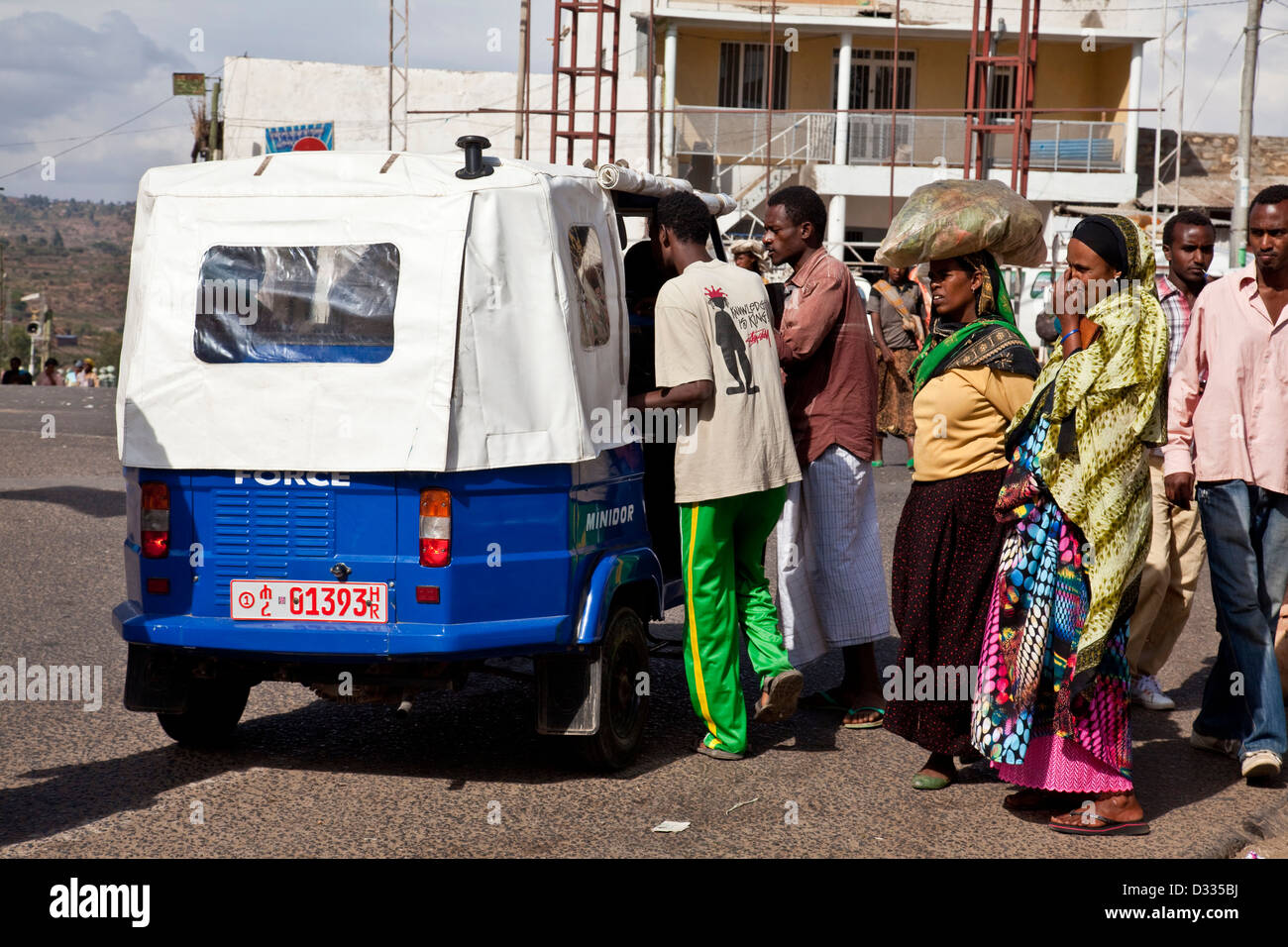 A Tuk Tuk Taxi collects passengers at Feres Megala Square, Jugol (Old