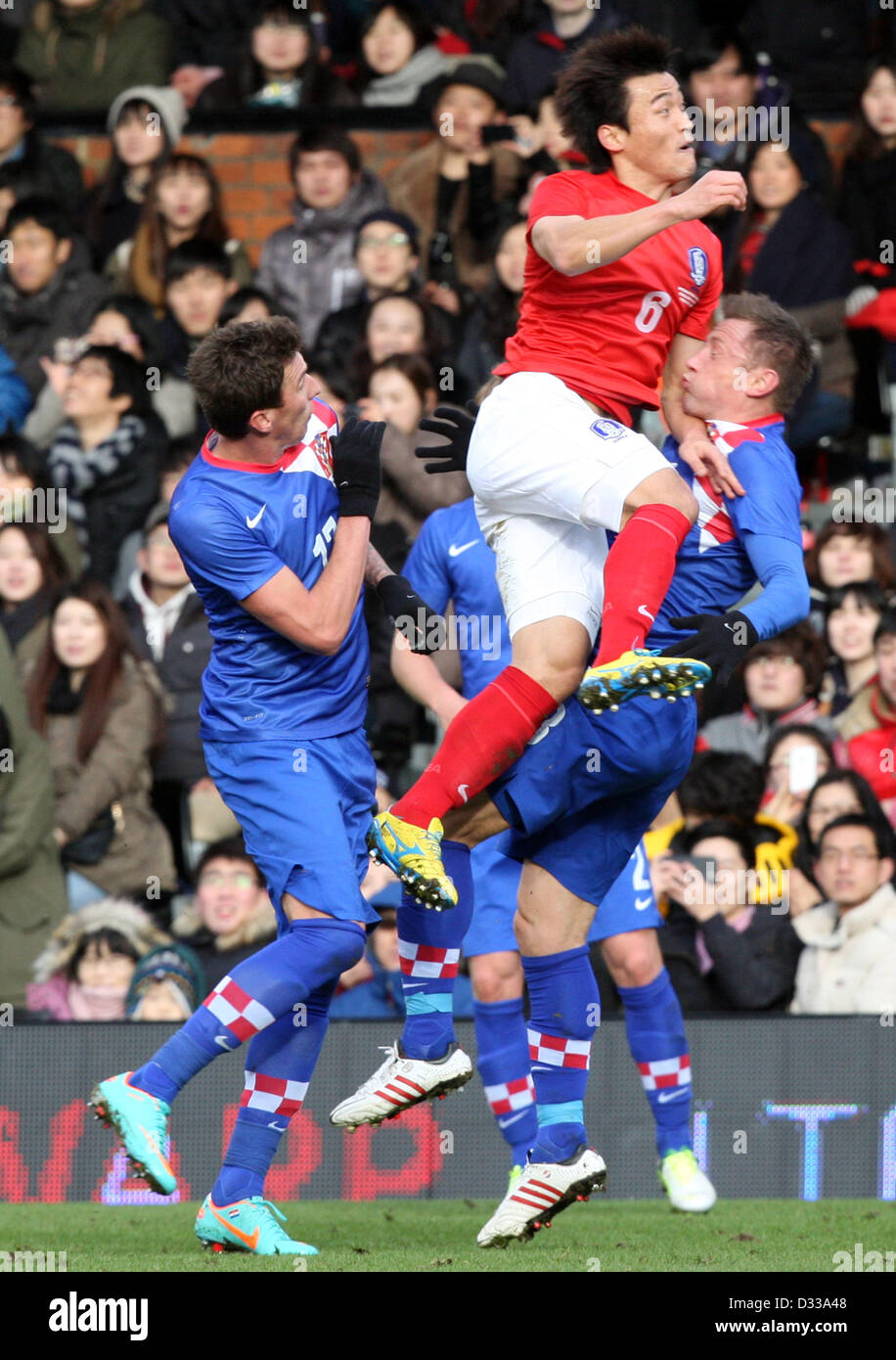 06.02.2013. London, England. South Korea's Shin Hyung-Min  and Croatia's Ivica Olic  in action during International Friendly game between Croatia and South Korea from Craven Cottage Stock Photo
