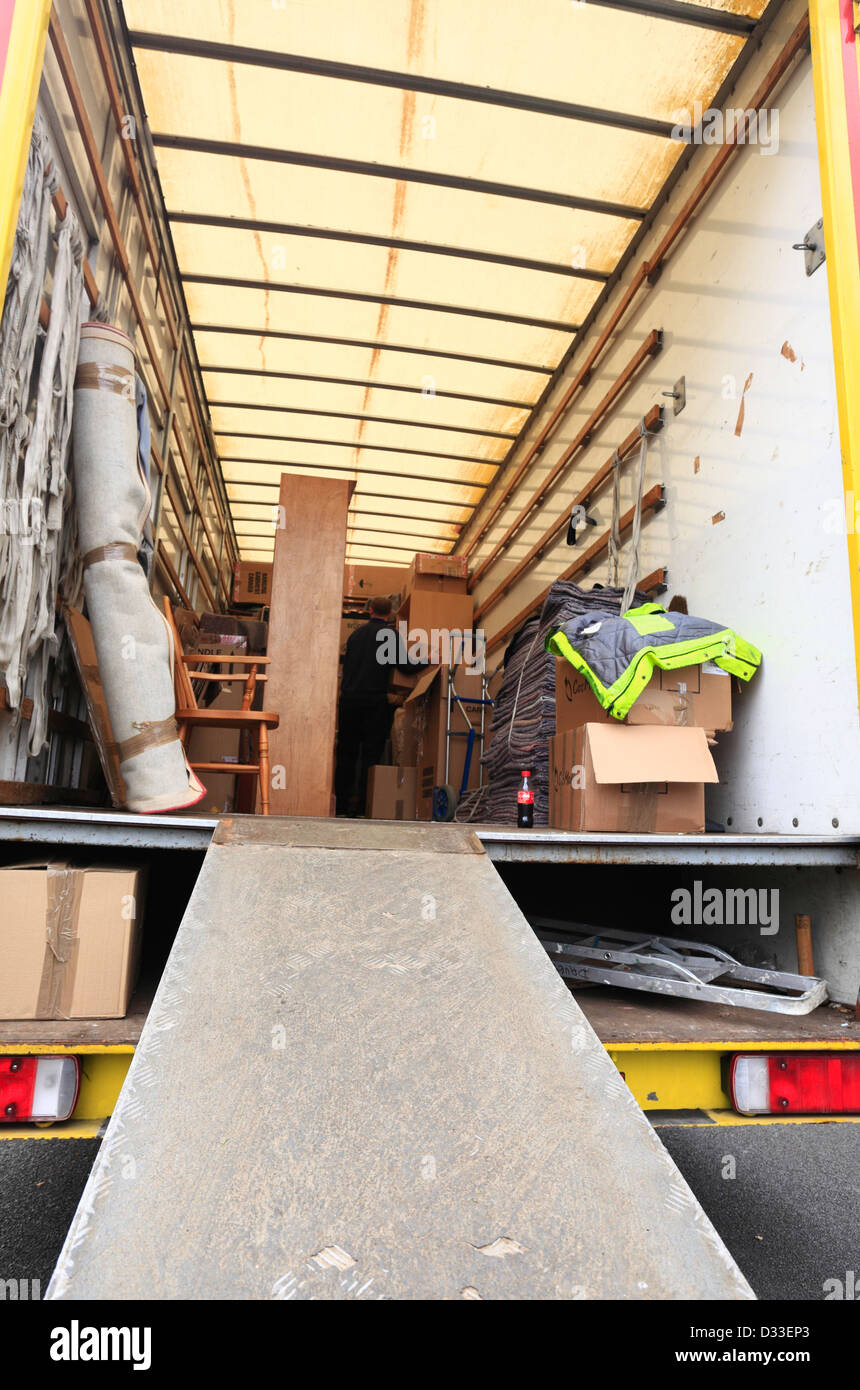 Looking into the back of a removal van part way through being filled