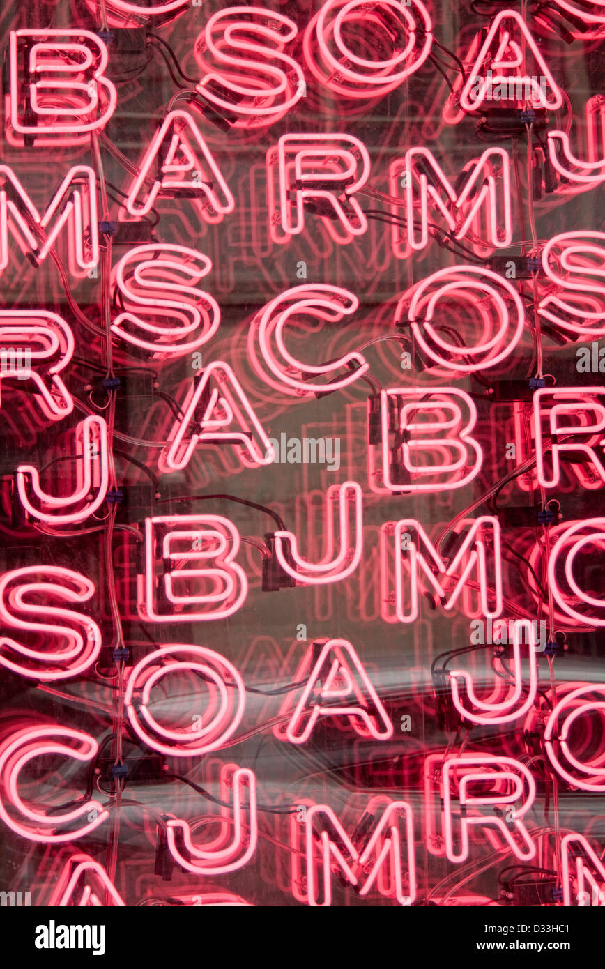 neon sign in shop window, letters Stock Photo