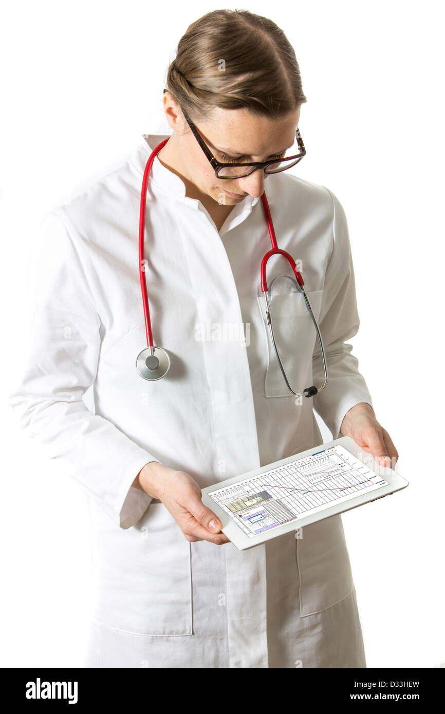 Symbolic image medicine. Doctor is using a tablet computer, Ipad. Stock Photo