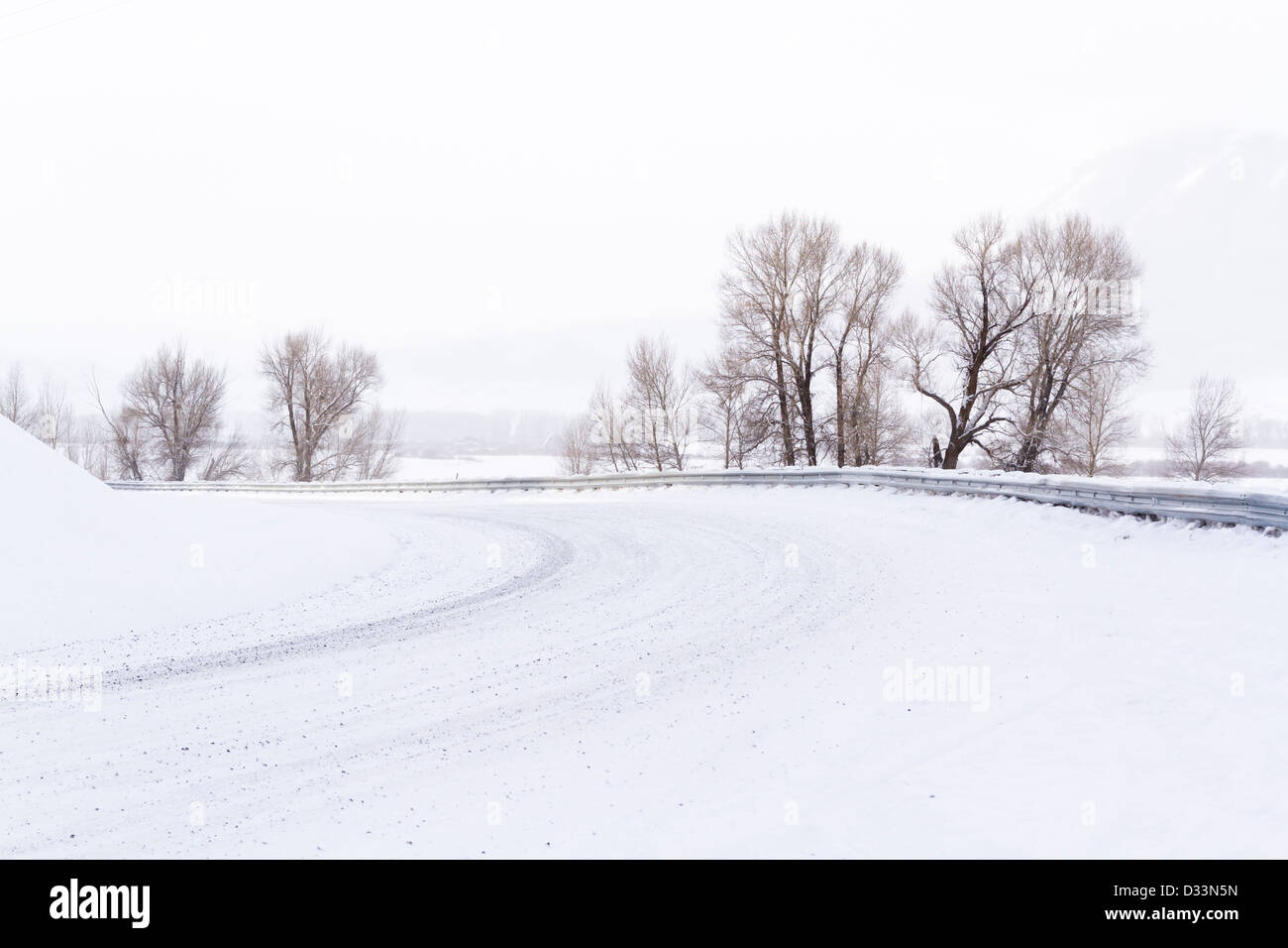 Road covered in snow after winter storm Stock Photo - Alamy