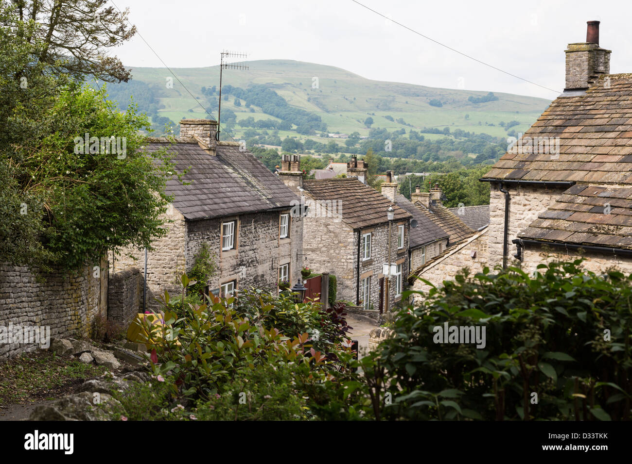 Stone Built Cottages And Rooftops In The Peak District Village Of