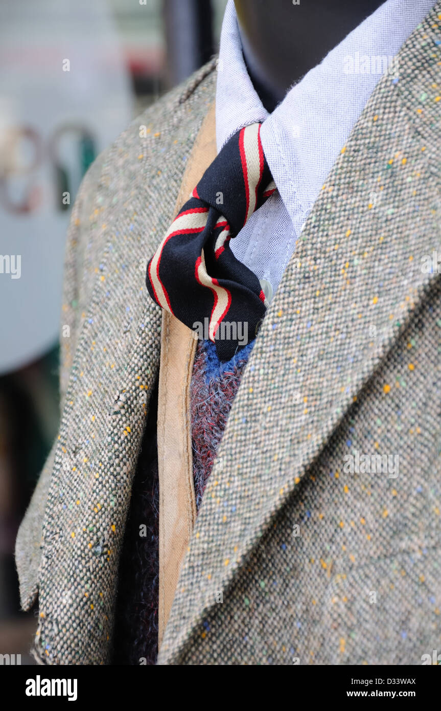 A male manikin dressed with old school tie and wool jacket. Stock Photo