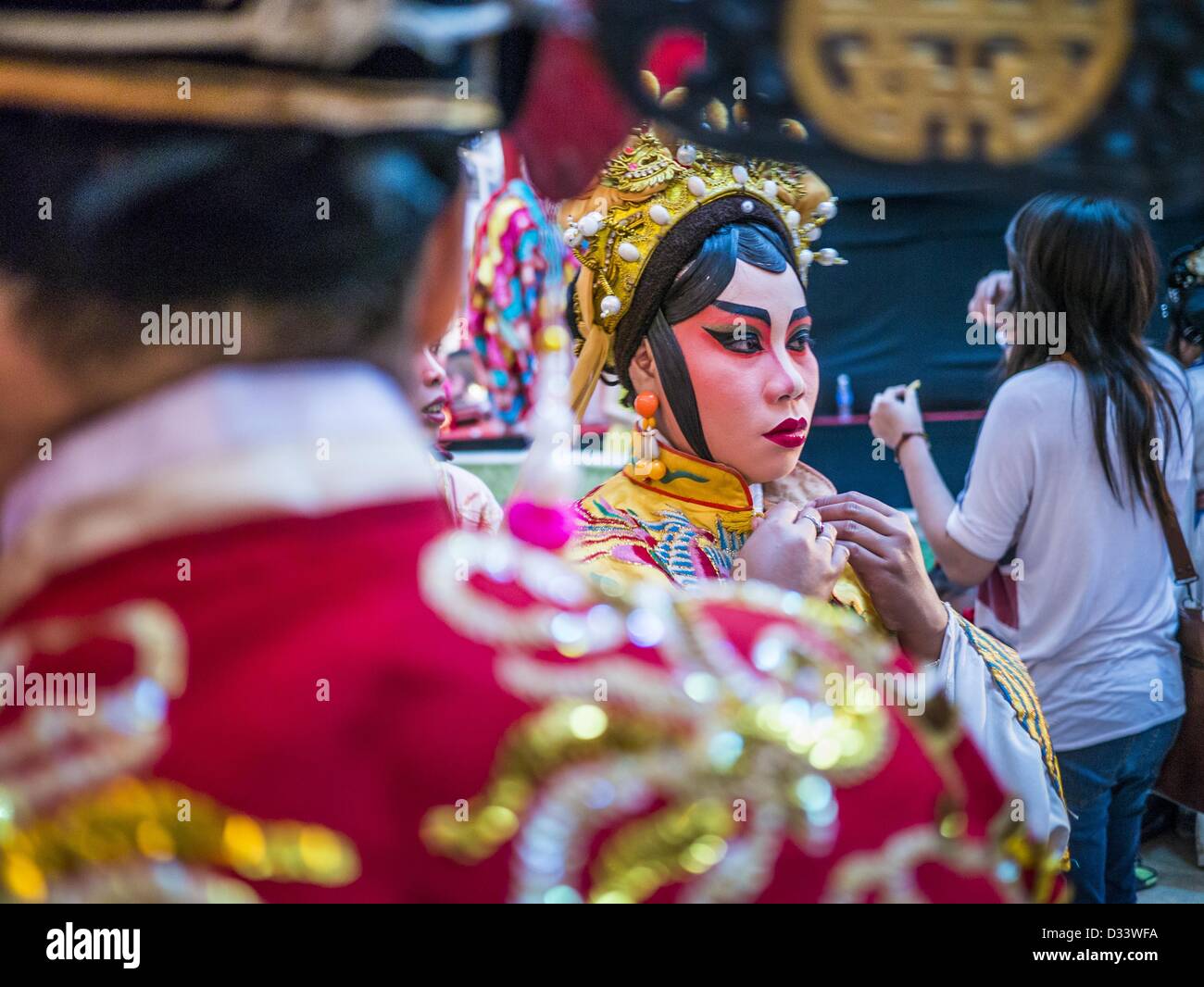 Bangkok, Thailand. 8th February 2013.  Chinese opera performers wait to go on stage for a Chinese New Year performance at Seacon Square in Bangkok. Chinese opera is popular in Thailand and is usually performed in the Teochew language. The weeks surrounding Chinese New Year are important for retailers in Thailand and many malls put on special promotions and events honoring Chinese culture, like Lion Dances or Chinese Opera. Credit:  ZUMA Press, Inc. / Alamy Live News Stock Photo