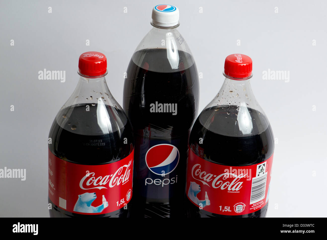 Two bottles of Coca Cola and one bottle of Pepsi Cola are picutred in  Berlin, Germany, 06 February 2013. Photo: Soeren Stache Stock Photo - Alamy