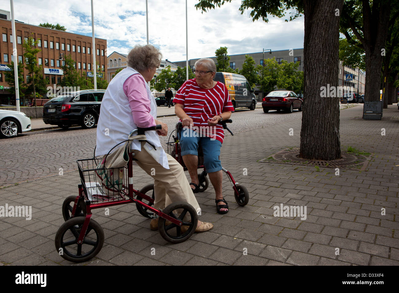 Two elderly ladies discussing Stock Photo