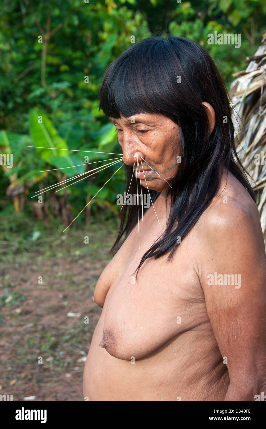 A Matses Mayorunas elderly woman with traditional whiskers and tattoos, Amazonian Peru Stock Photo