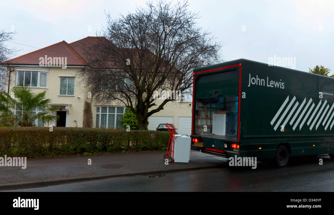 John Lewis Delivery Lorry Delivering A Washing Machine To A House In