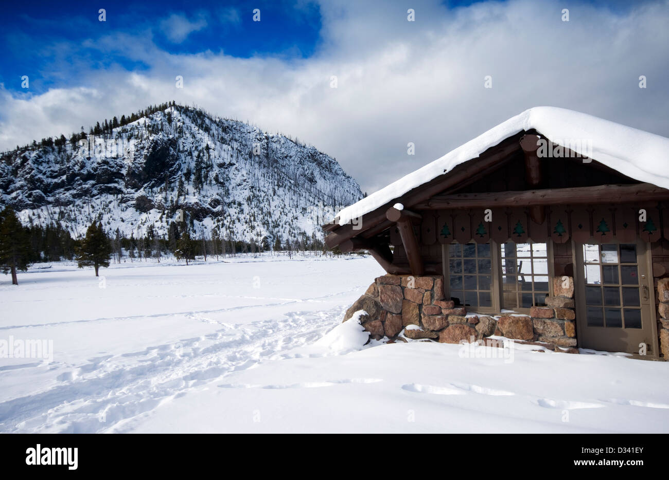 Log Cabin In The Snow Near Madison Station At Yellowstone National