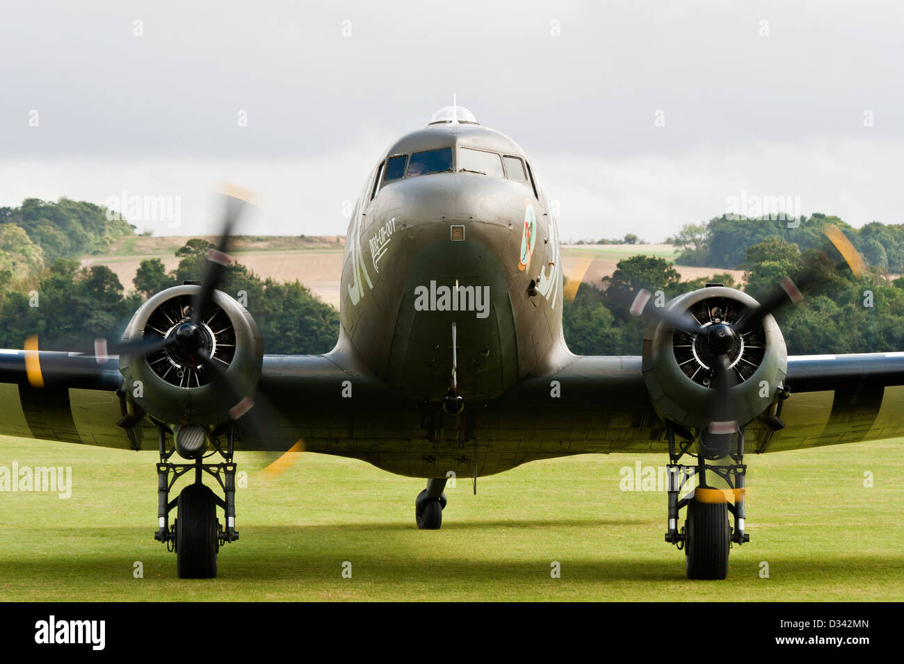 Douglas C47 with engines running at Duxford airfield. Stock Photo