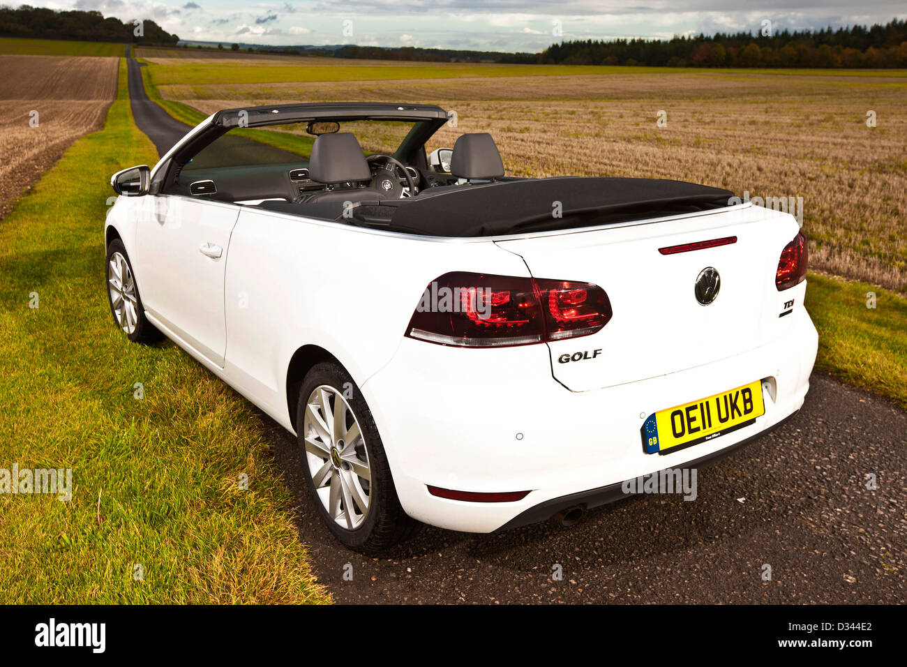 Volkswagen Golf 1.6 TDI convertible on country lane, Winchester, UK, 25 10 2010 Stock Photo