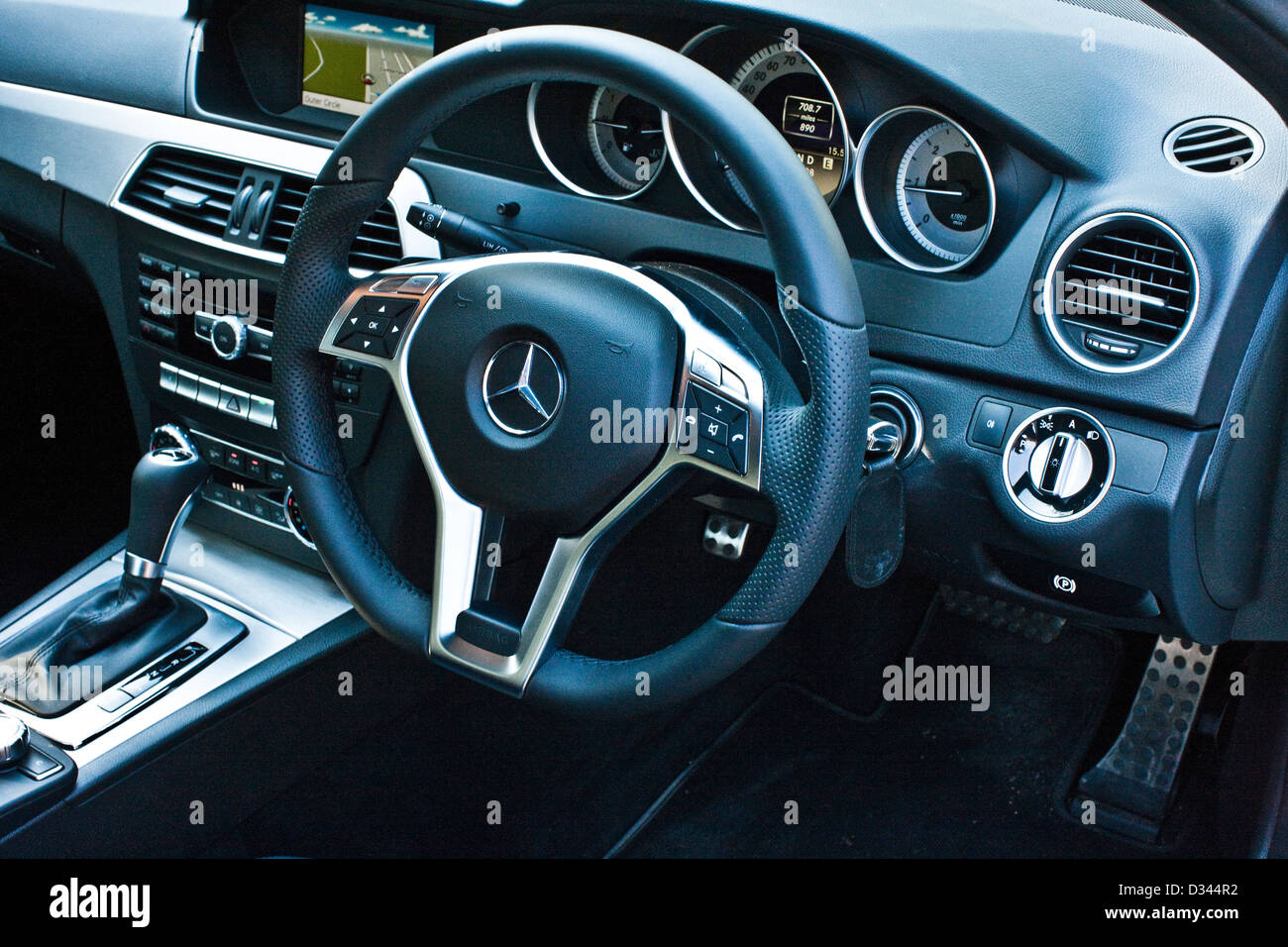 Steering wheel and dashboard in the Mercedes C Class Diesel, London street, UK, 19 04 2011 Stock Photo