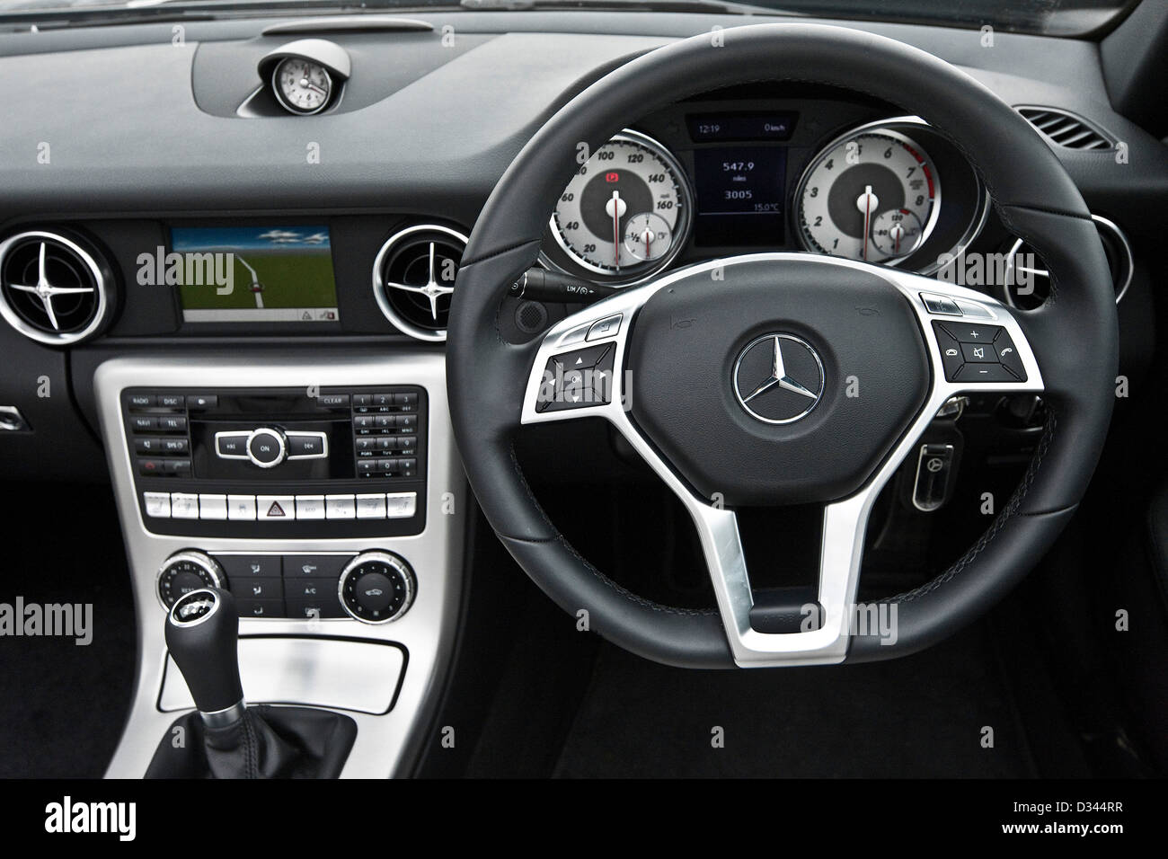 Dashboard and steering wheel in the Mercedes SLK 200 convertible, Pickering, UK, 28 06 2011 Stock Photo
