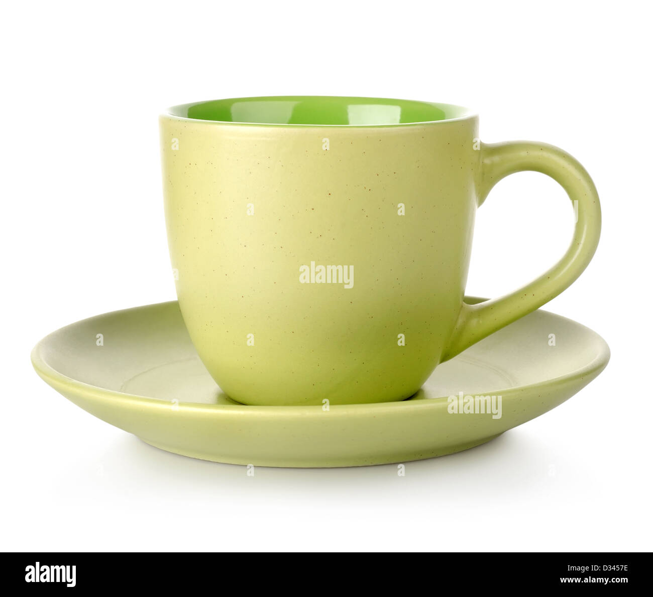 Green cup and saucer isolated on white background Stock Photo - Alamy