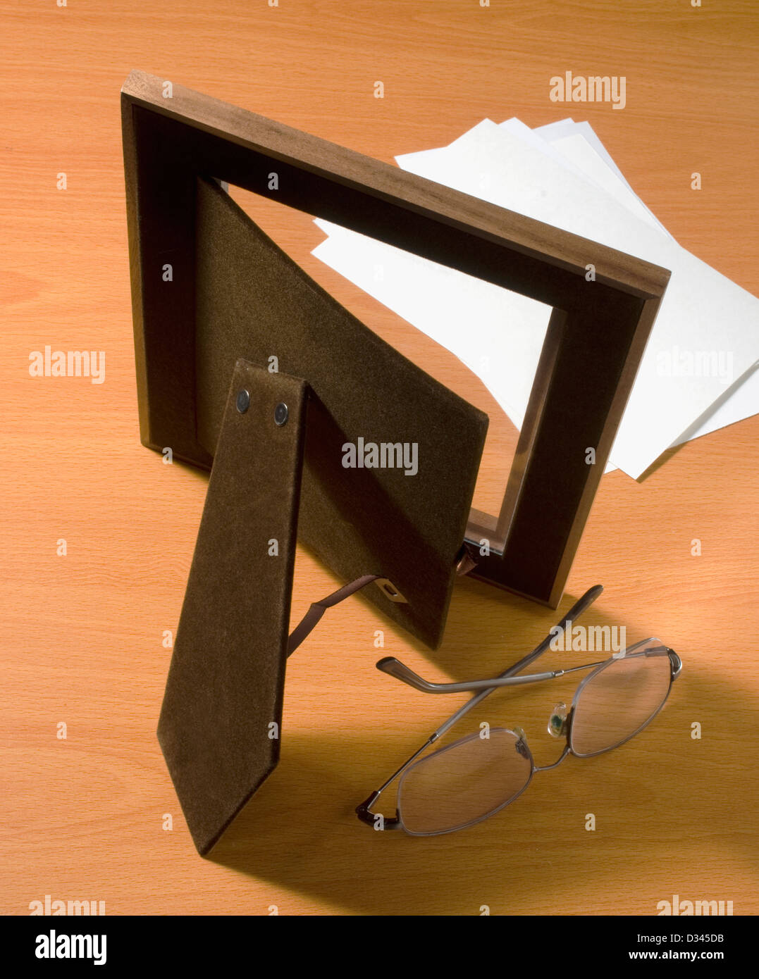 open picture frame from rear with group of photos Stock Photo Alamy