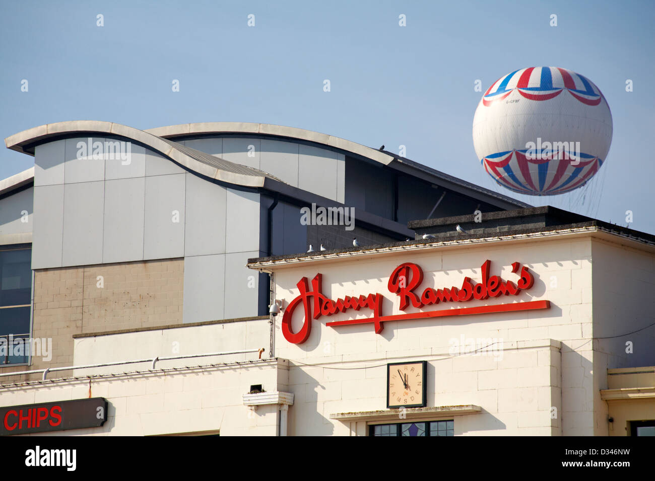 Bournemouth balloon over the IMax building on the waterfront and Harry Ramsden's Fish & Chip restaurant in March Stock Photo