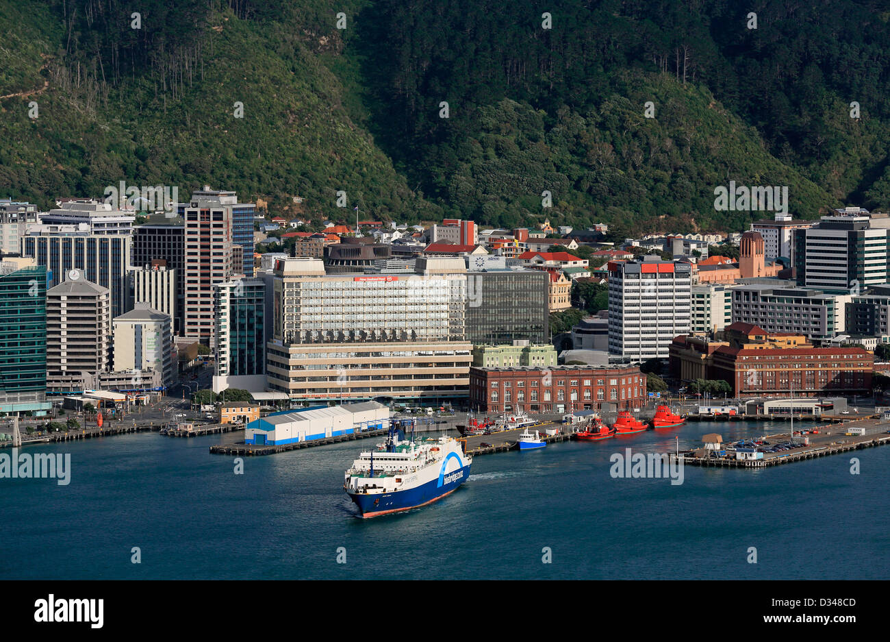 The Bluebridge Cook Strait ferry departs Lambton Harbour in Wellington city. Stock Photo