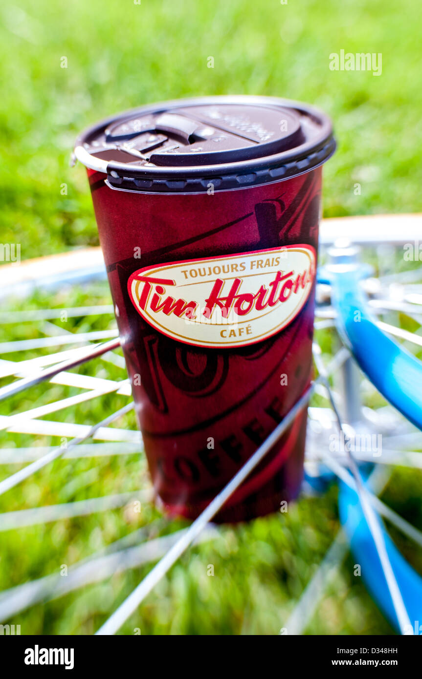 Canada's Iconic coffee with a bike wheel as cup holder Stock Photo