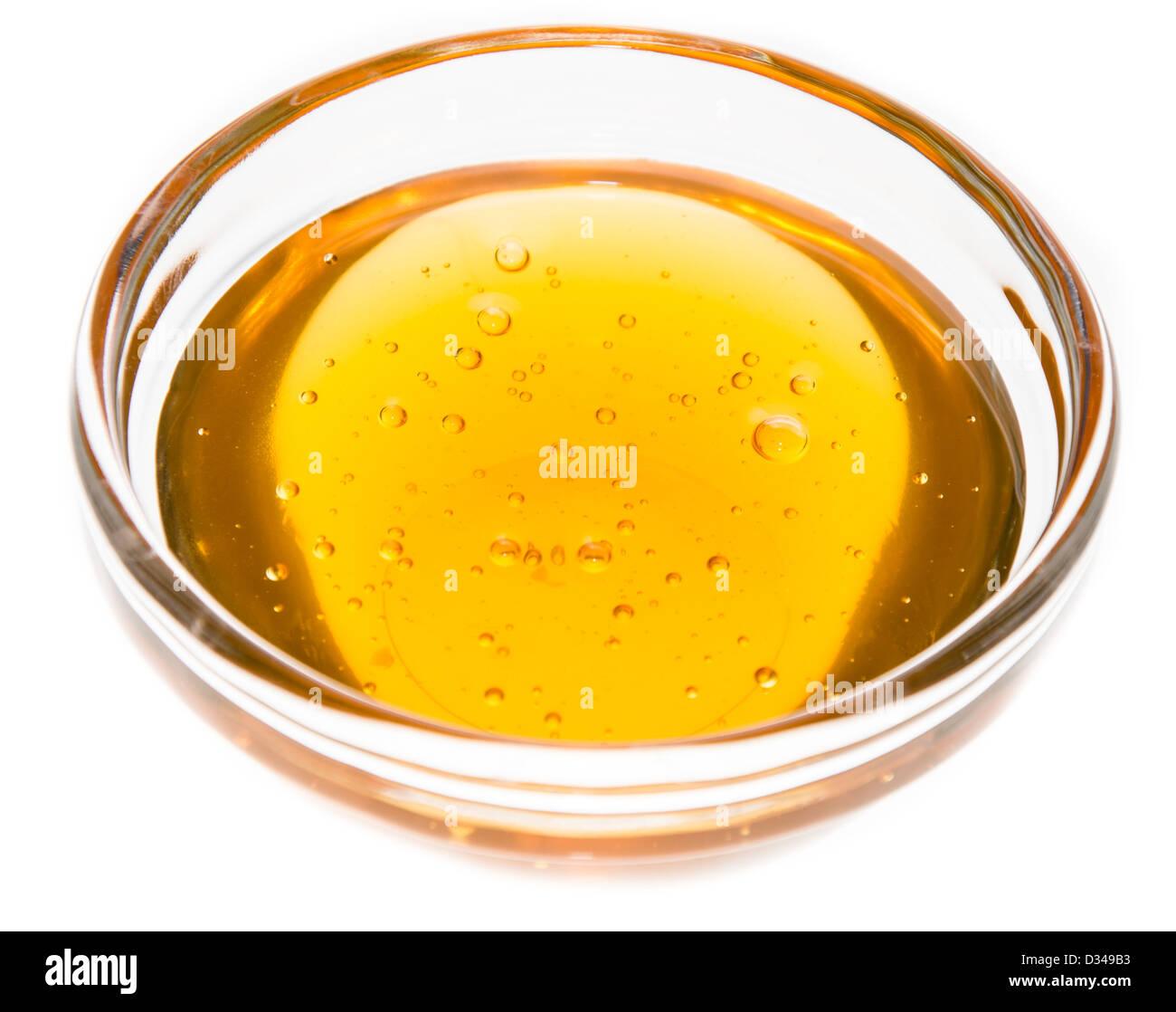 Golden Honey in a small bowl Stock Photo Alamy